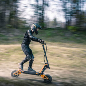 Inmotion RS electric scooter man riding in the forest
