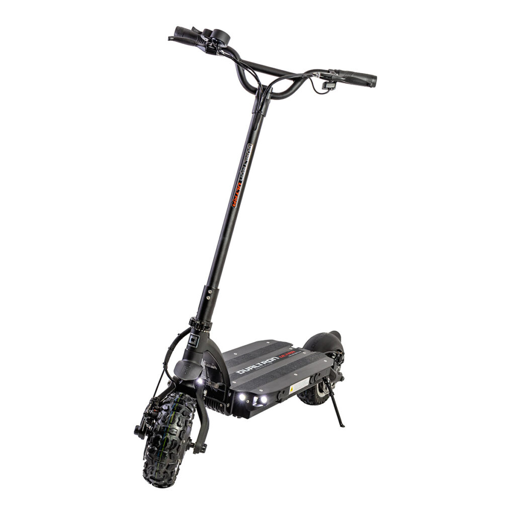 Electric scooter Dualtron Ultra in urban environment showcasing sleek design and robust build.