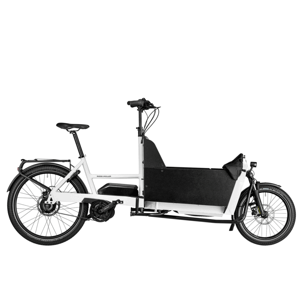 Side view of white Riese & Müller Transporter 85 electric cargo bike with front-loading box.