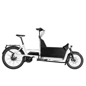 Side view of white Riese & Müller Transporter 85 electric cargo bike with front-loading box.