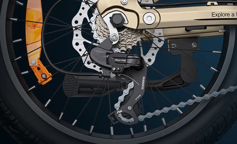 Close-up of the champagne Engwe L20 3.0 Pro electric bicycle's Shimano gear shift.