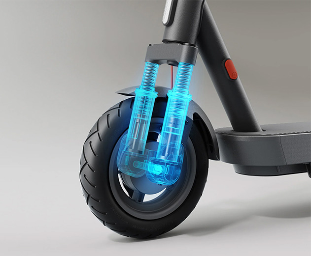 Close-up of the Xiaomi 5 electric scooter's front shock absorbers.
